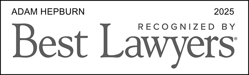 A black and white legal award logo saying Adam Hepburn Recognized By Best Lawyers